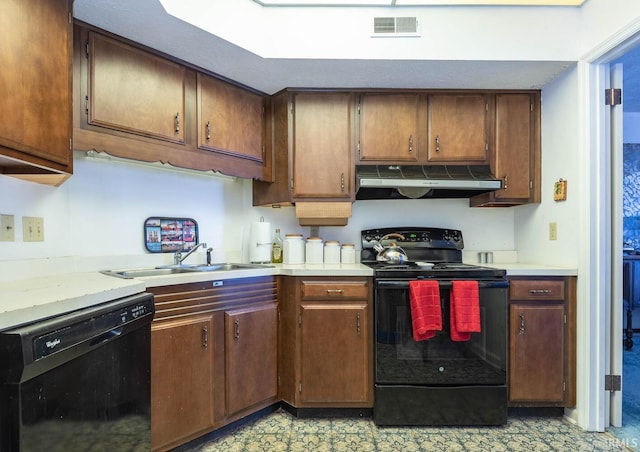 kitchen with sink and black appliances