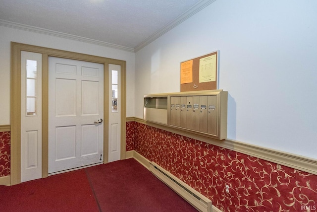 carpeted entrance foyer featuring ornamental molding, mail boxes, and baseboard heating