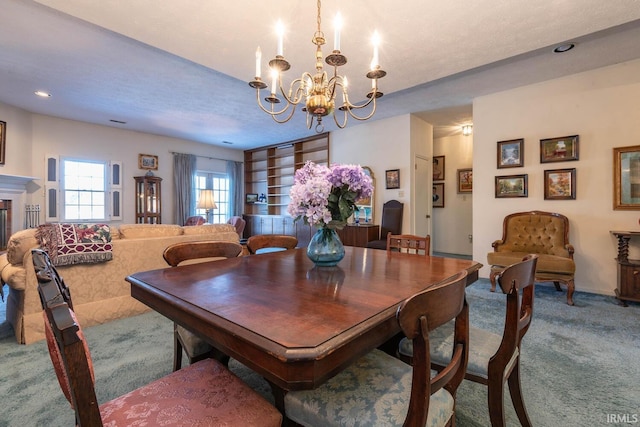 carpeted dining space featuring a notable chandelier