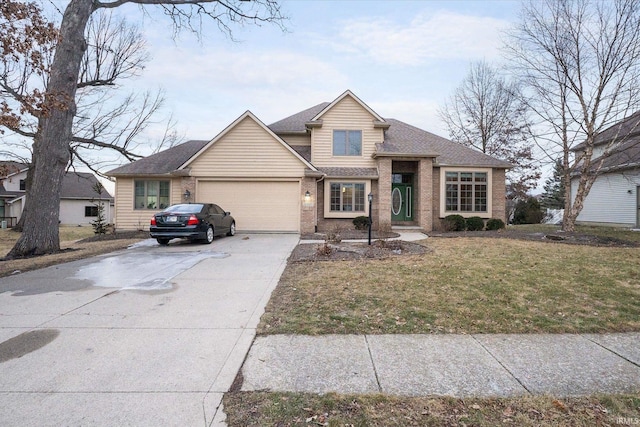 view of front of house with a garage and a front lawn