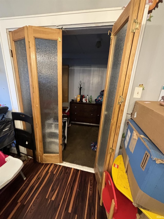 bathroom with hardwood / wood-style flooring