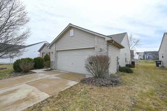 view of side of home with a garage, a lawn, and central air condition unit