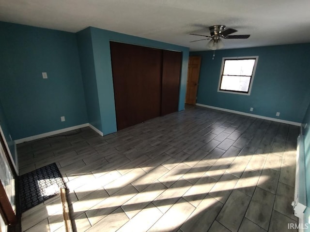 unfurnished bedroom with ceiling fan