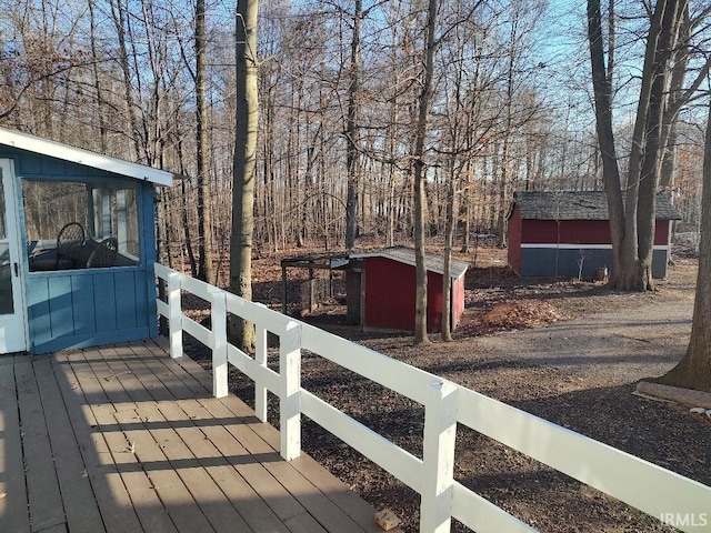 wooden deck with a storage unit