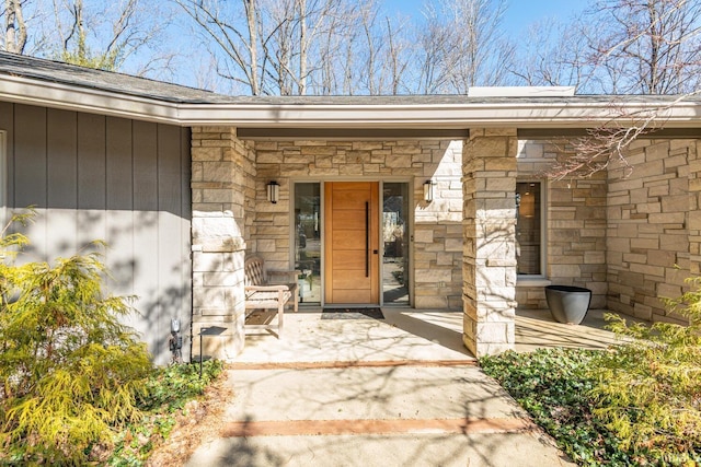 property entrance with a patio