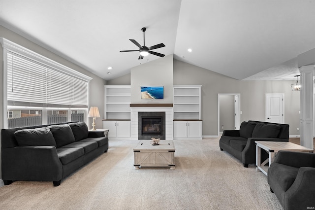 carpeted living room featuring high vaulted ceiling, built in features, and ceiling fan