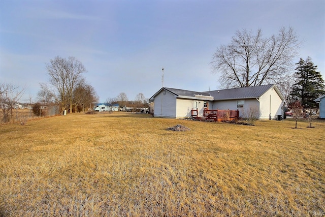 view of yard with a wooden deck