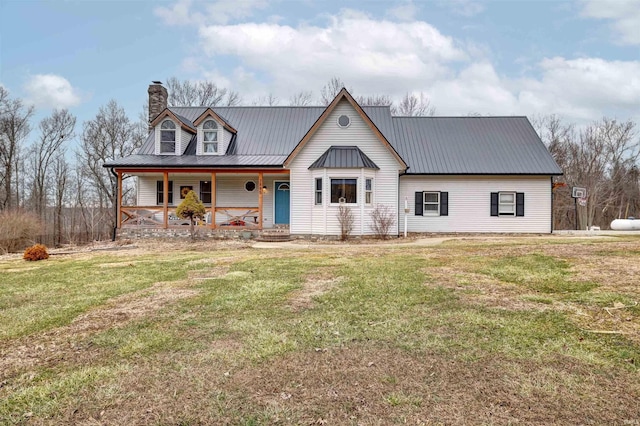 view of front facade featuring a front lawn and covered porch