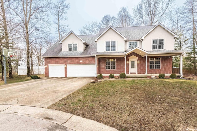 view of front of property with a porch, a garage, and a front lawn