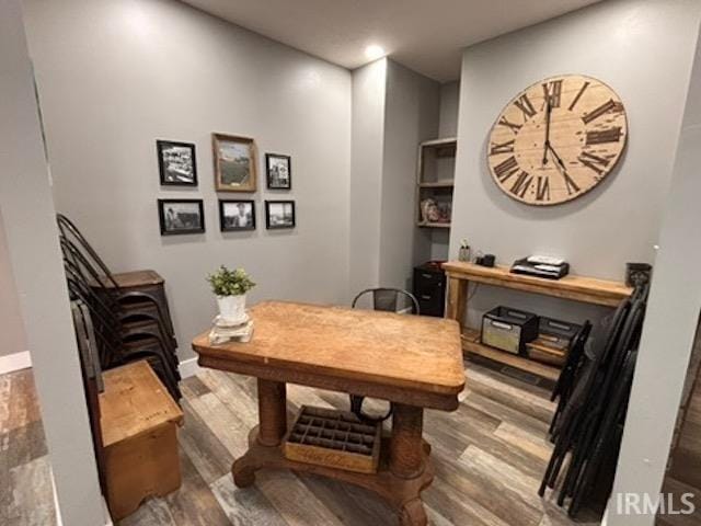 office area with wood-type flooring