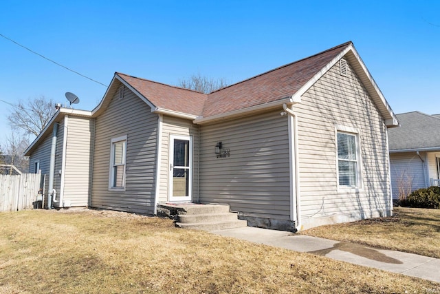 view of front of home with a front lawn