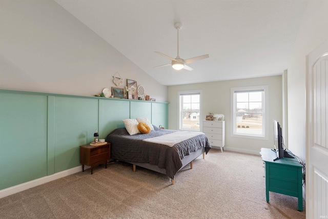 bedroom with carpet, lofted ceiling, and ceiling fan