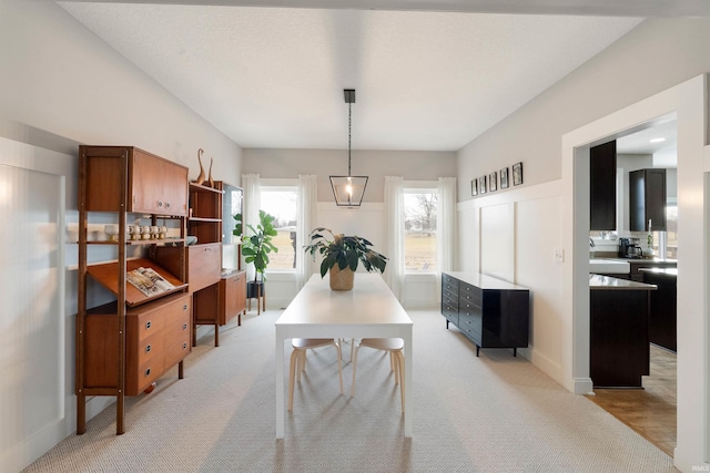 view of carpeted dining space