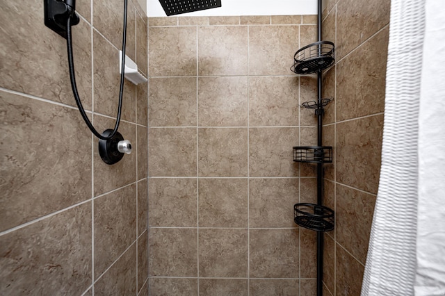 room details with a tile shower