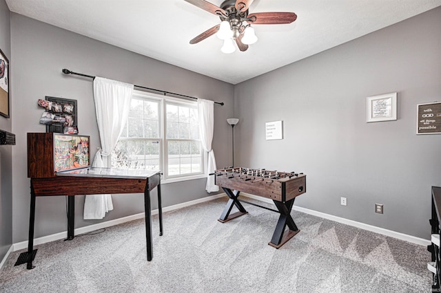 playroom featuring carpet flooring and ceiling fan