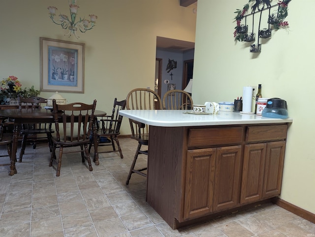kitchen with a kitchen bar and kitchen peninsula