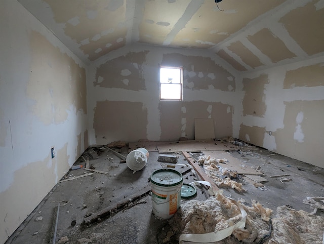 interior space featuring vaulted ceiling