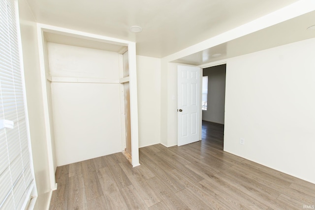 unfurnished bedroom featuring light hardwood / wood-style floors