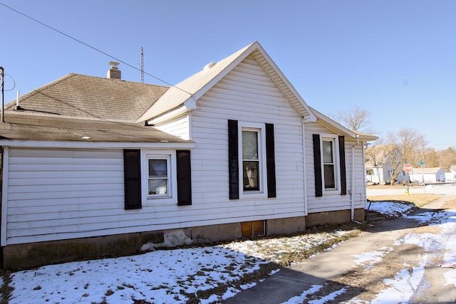 view of snow covered property