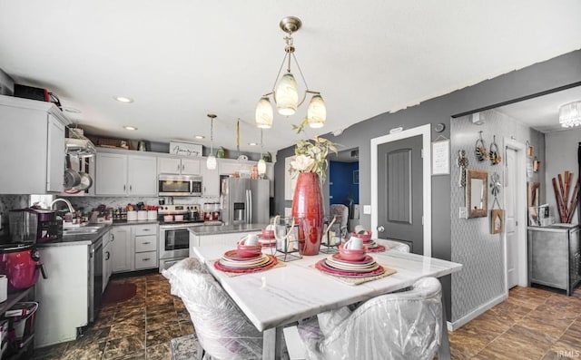 dining space with sink