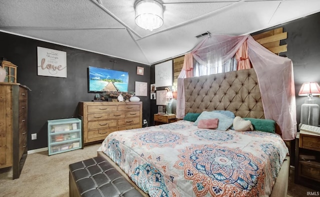 carpeted bedroom featuring lofted ceiling