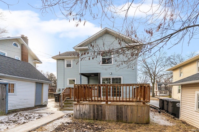 rear view of house with a deck