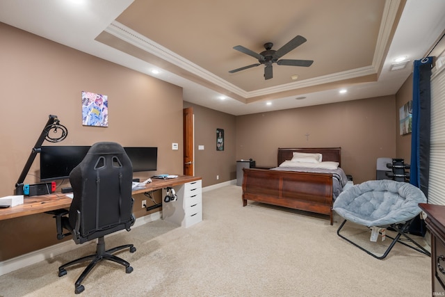 bedroom with a raised ceiling, ornamental molding, and light colored carpet