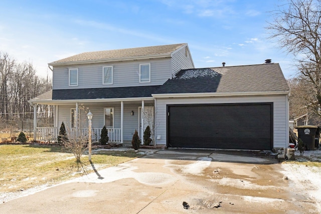 view of front of property with a garage and a porch