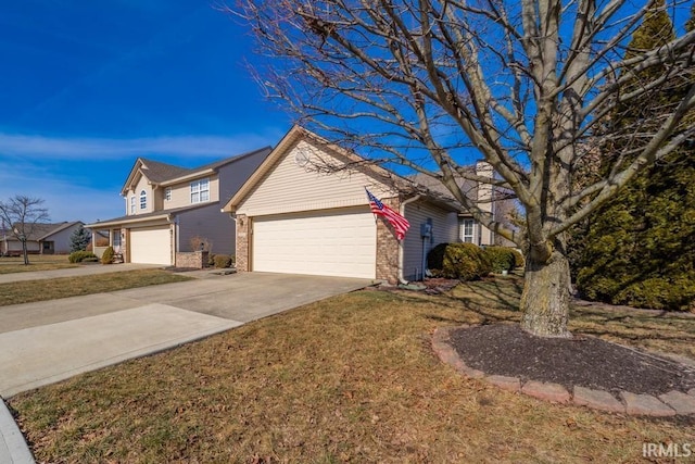 view of front of house featuring a garage and a front lawn