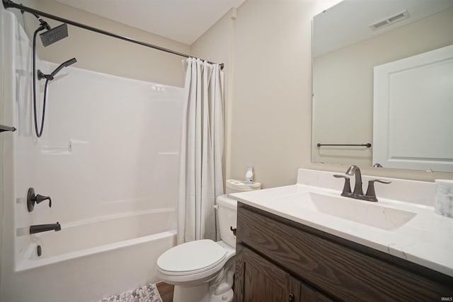 full bathroom featuring shower / bathtub combination with curtain, vanity, and toilet