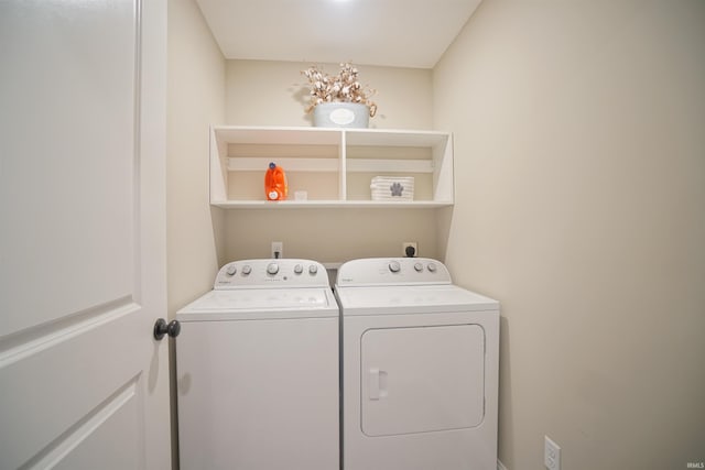 laundry room featuring independent washer and dryer