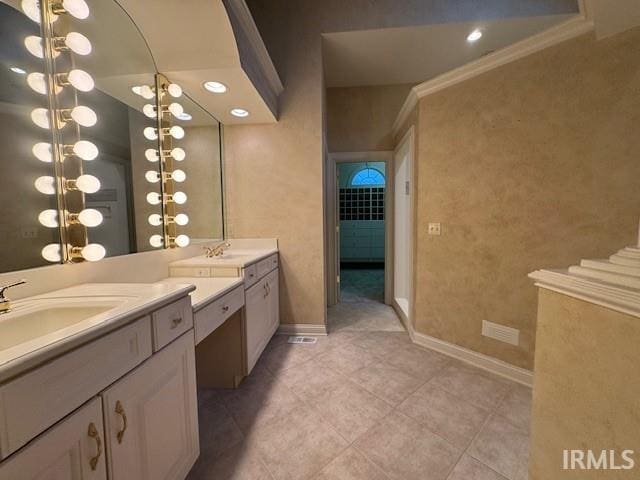 bathroom featuring vanity and tile patterned flooring