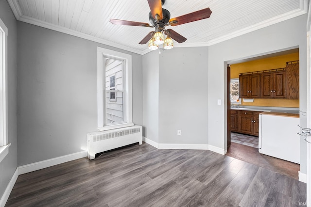 interior space featuring ornamental molding, dark hardwood / wood-style floors, and radiator