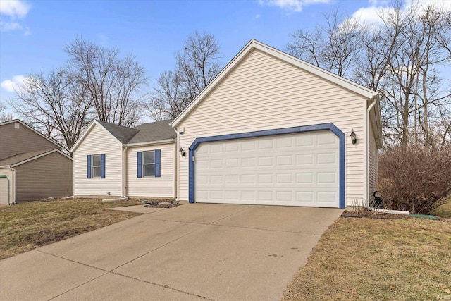 ranch-style house with a garage and a front lawn