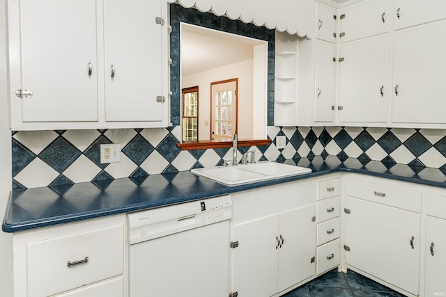 kitchen featuring white cabinetry, white dishwasher, and sink