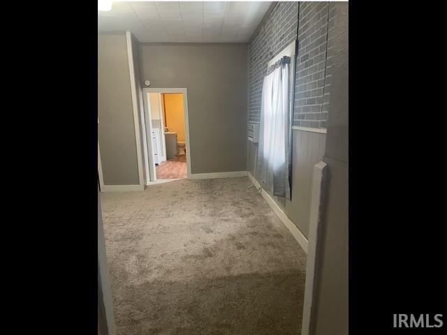 corridor with carpet floors