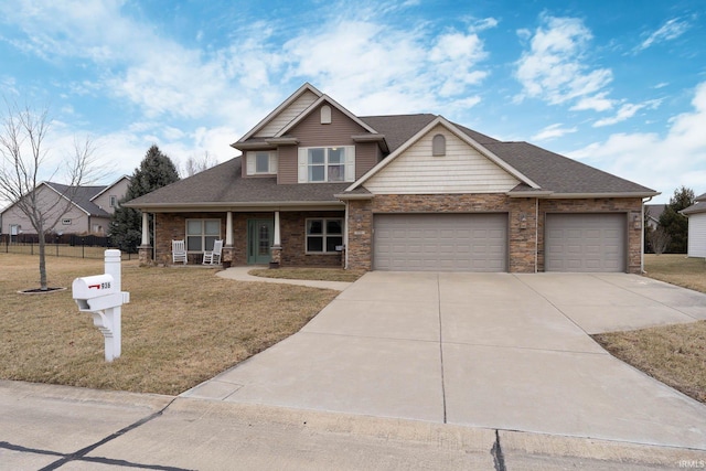 craftsman inspired home featuring a garage, a porch, and a front lawn