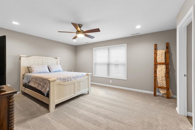 carpeted bedroom featuring ceiling fan