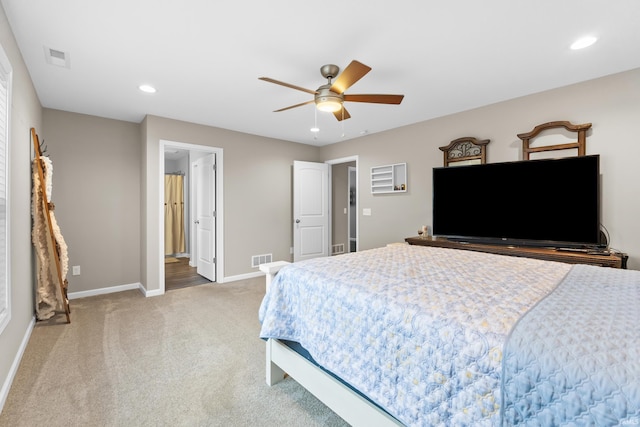 carpeted bedroom with ceiling fan