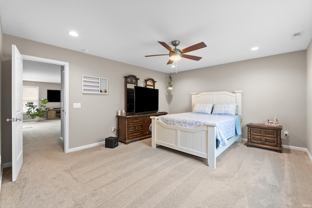 carpeted bedroom with ceiling fan