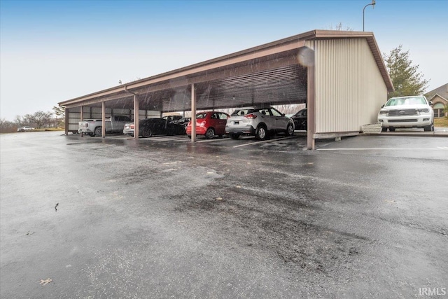 view of car parking featuring a carport