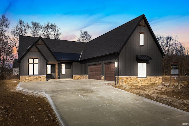 view of front of property featuring a garage