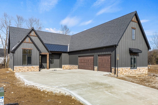 modern farmhouse featuring a garage