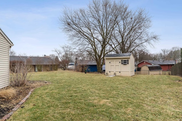 view of yard with a storage shed