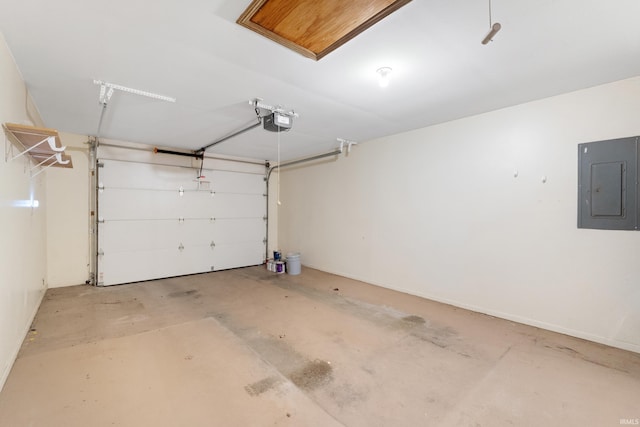 garage featuring a garage door opener and electric panel