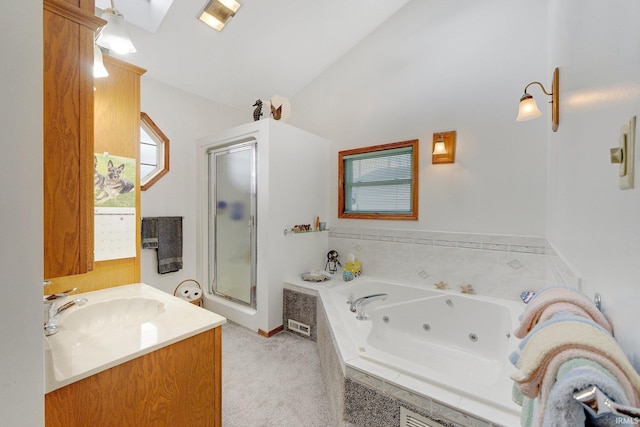 bathroom featuring lofted ceiling, vanity, and separate shower and tub