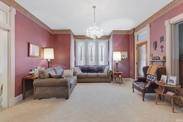 carpeted living room featuring a chandelier