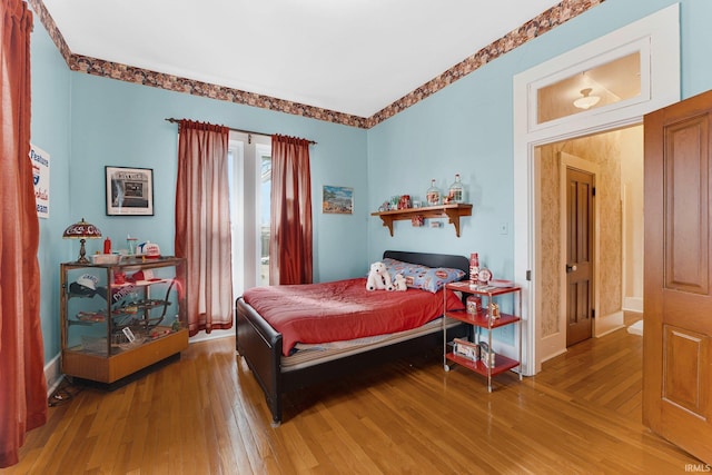 bedroom featuring wood-type flooring