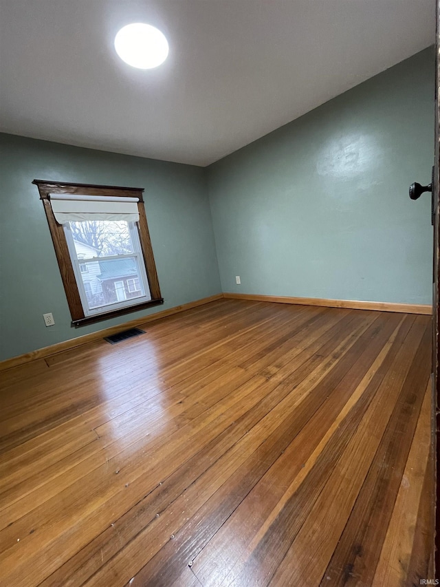 unfurnished room featuring light wood-type flooring