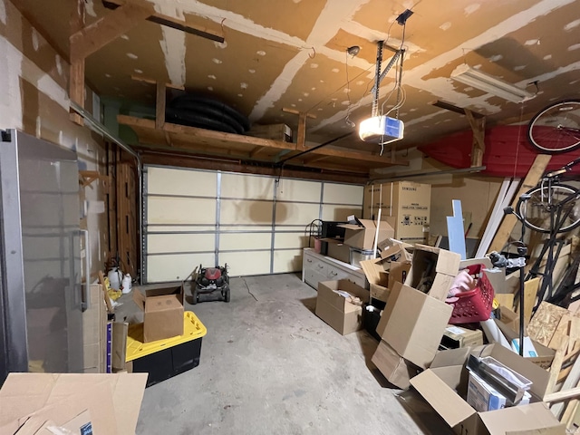 garage featuring a garage door opener